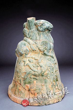 重庆出土近百座摇钱树:树座雕刻多为羊(图)