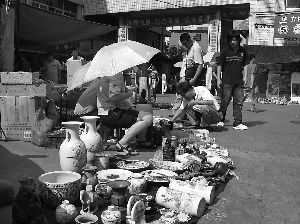 收藏品市场呼唤新的投资模式